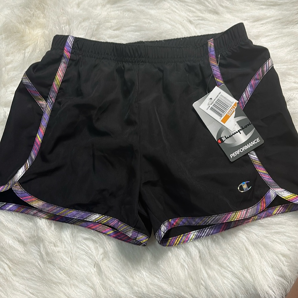 Brand new champion shorts size am girls.